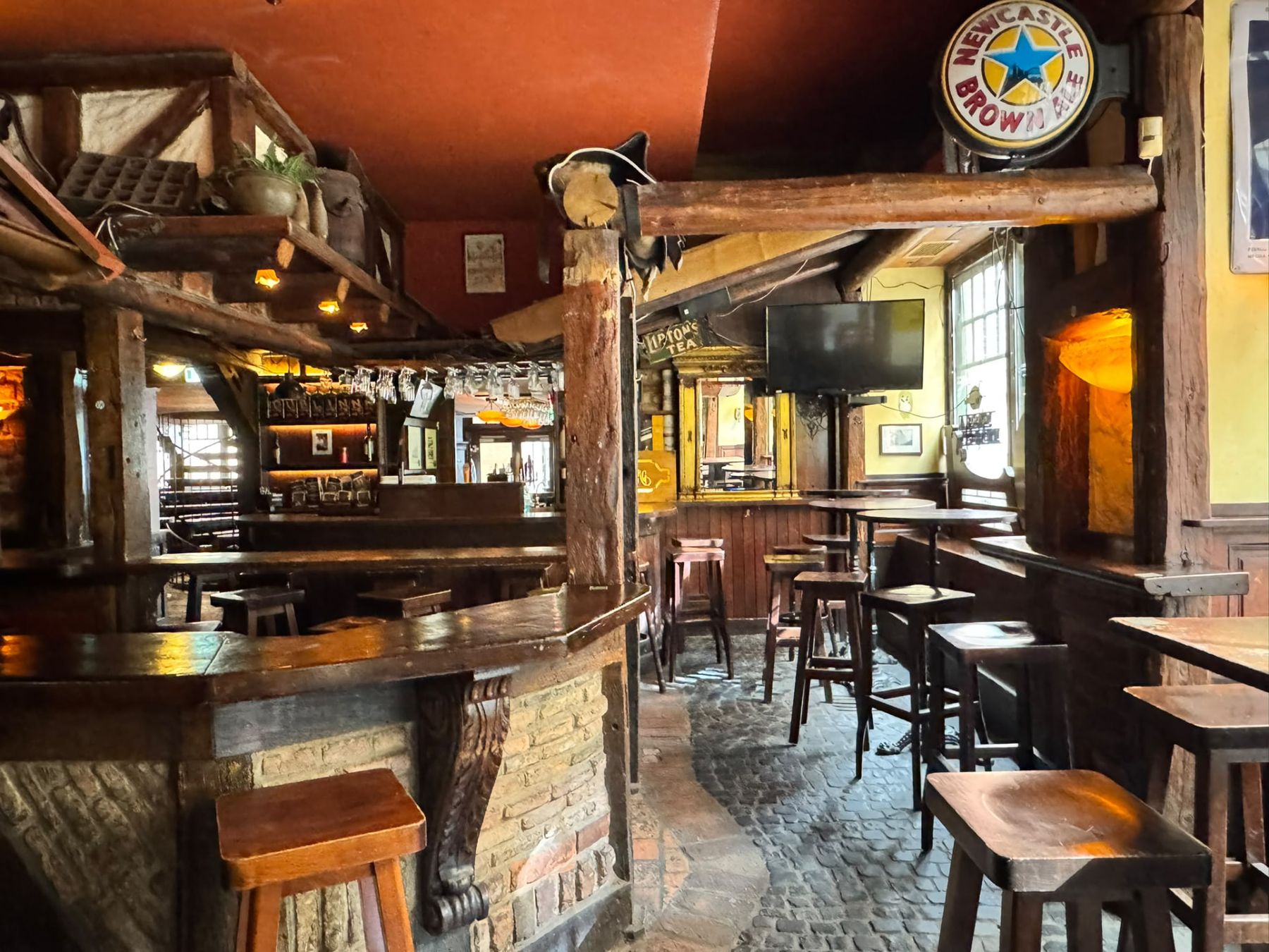 Back bar with timber beams inside Dublin Inn Hannover